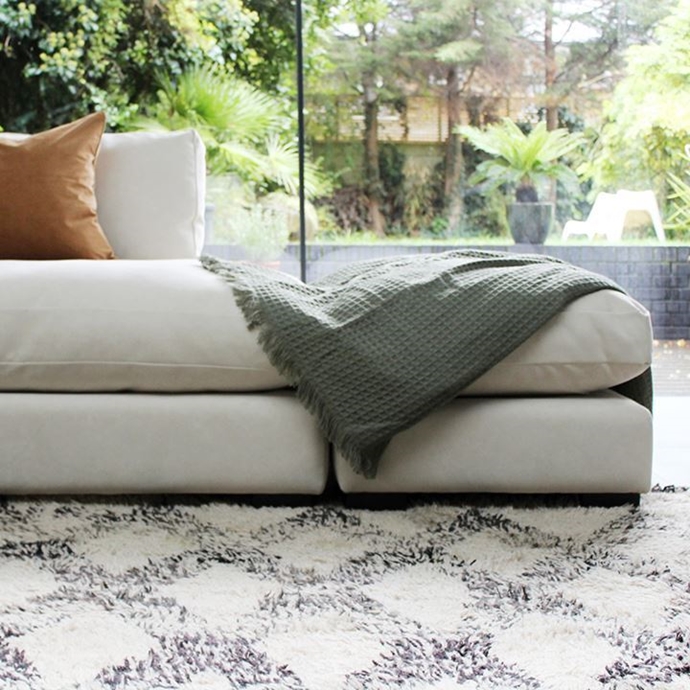 corner sofa and foot stool