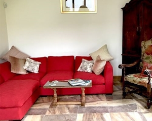 Customer Image:  Wadenhoe RHF Corner Unit in Designers Guild Carlyon Scarlet